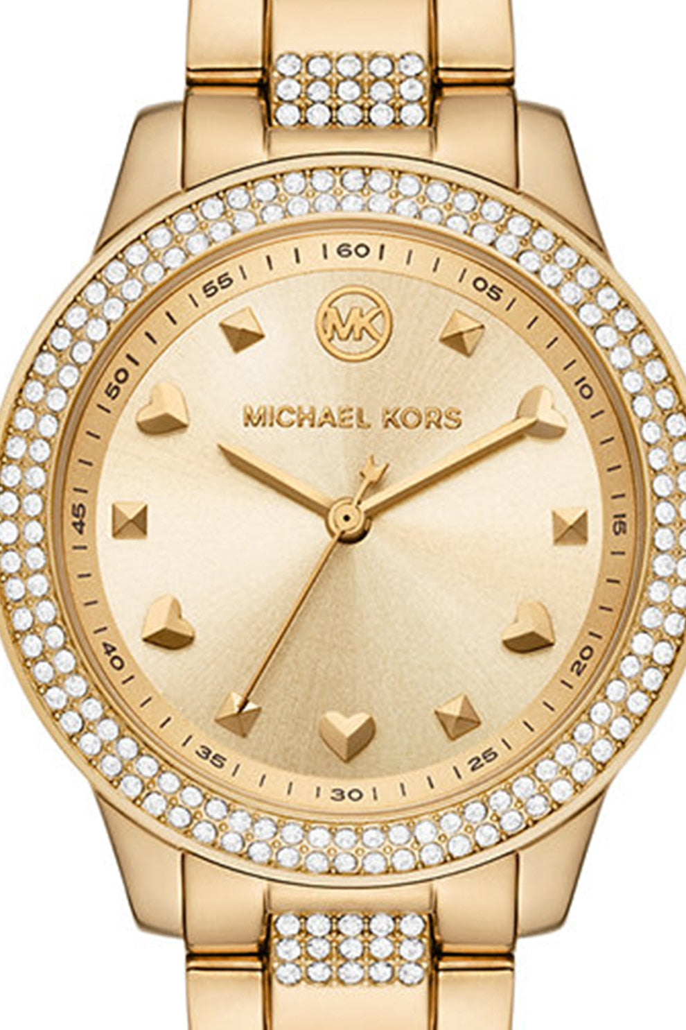 Michael Kors Tibby watch worn, displaying crystal bezel and gold bracelet with diamond accents