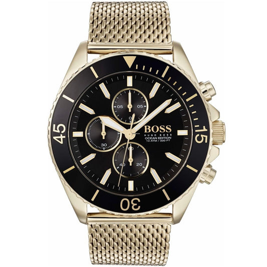 Gold watch with black face on a white background