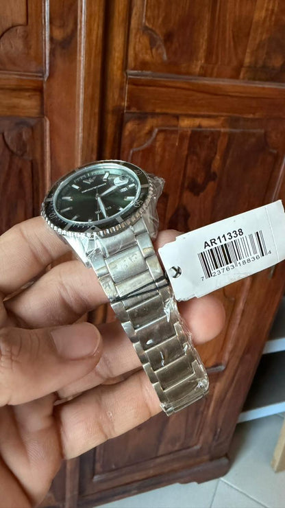 Emporio Armani AR11338 green dial diver watch with silver bracelet worn on wrist