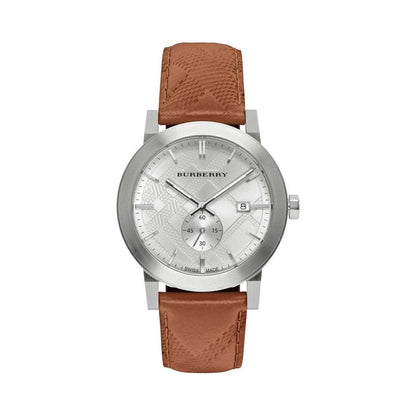 Burberry The City BU9904 watch face with white dial, silver case, and brown leather strap