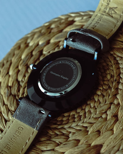 Christopher Kingsley watch caseback showing black case back with engraved text