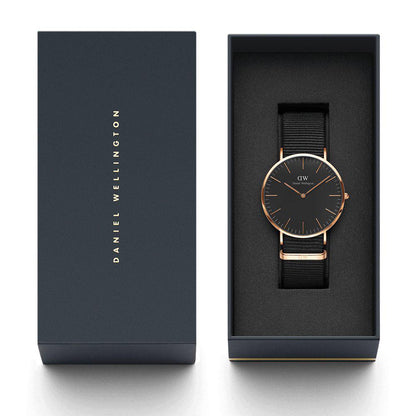 Daniel Wellington Cornwall watch with packaging and owner's guide manual