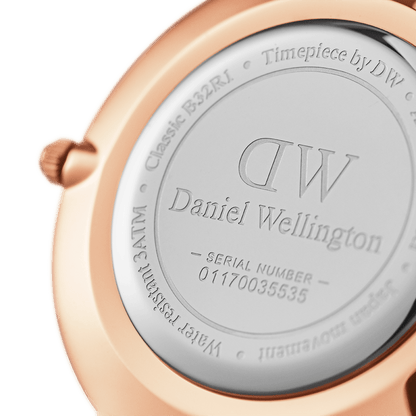 Daniel Wellington Petite 32mm Black Rose Gold Dial White Leather Strap DW00100283