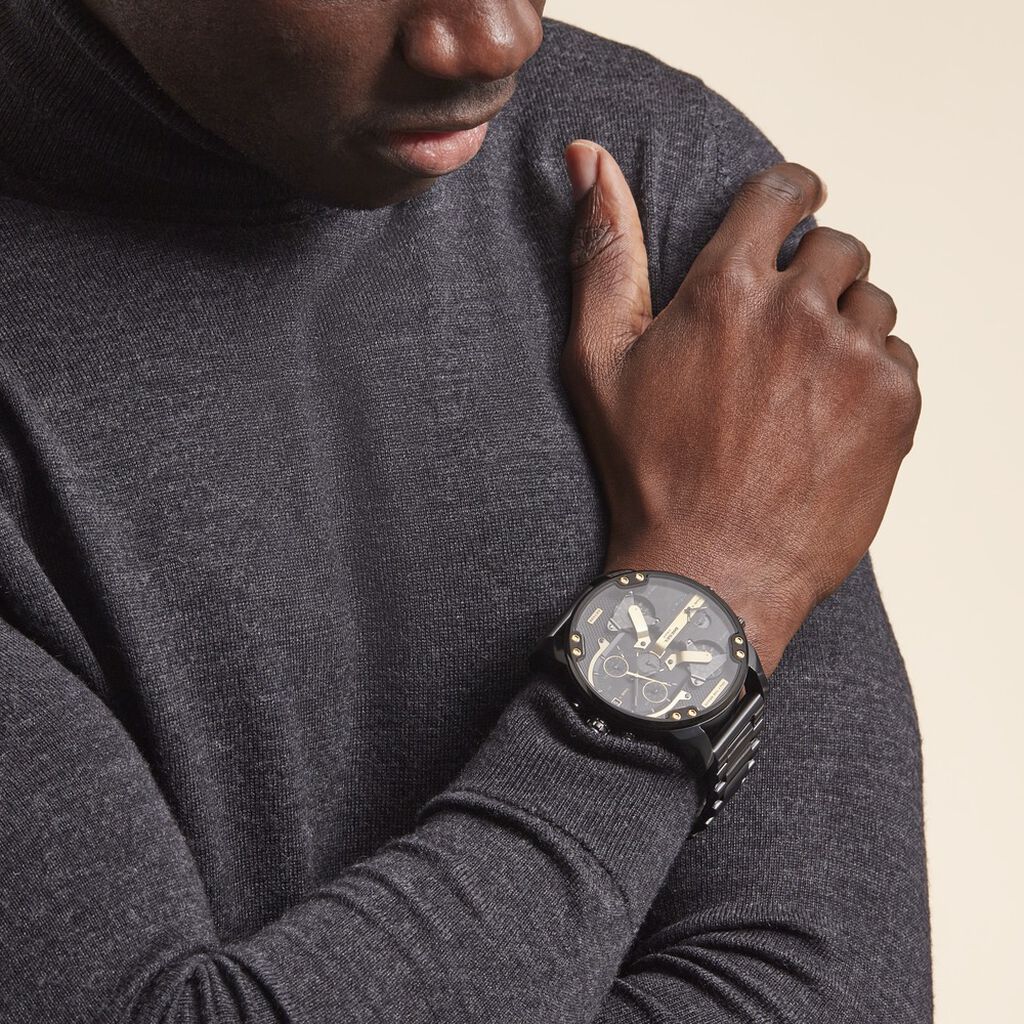 Mr. Daddy 2.0 chronograph watch with black and gold dial worn on wrist in lifestyle setting