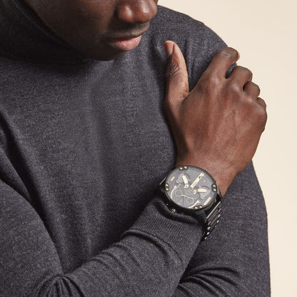Mr. Daddy 2.0 chronograph watch with black and gold dial worn on wrist in lifestyle setting
