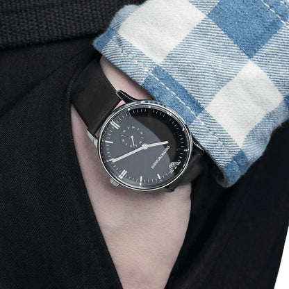 Emporio Armani AR0382 Gianni watch worn on wrist with black leather strap