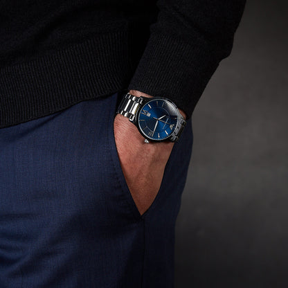 Emporio Armani AR11227 watch worn on wrist showing blue dial and silver-tone case