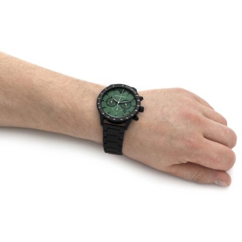 AR11472 chronograph watch worn on wrist showing green dial and black bracelet