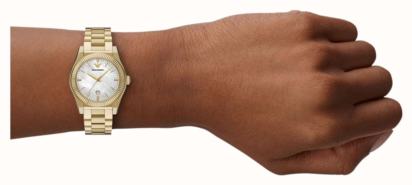 Emporio Armani AR11657 gold-tone watch worn on wrist, white dial visible