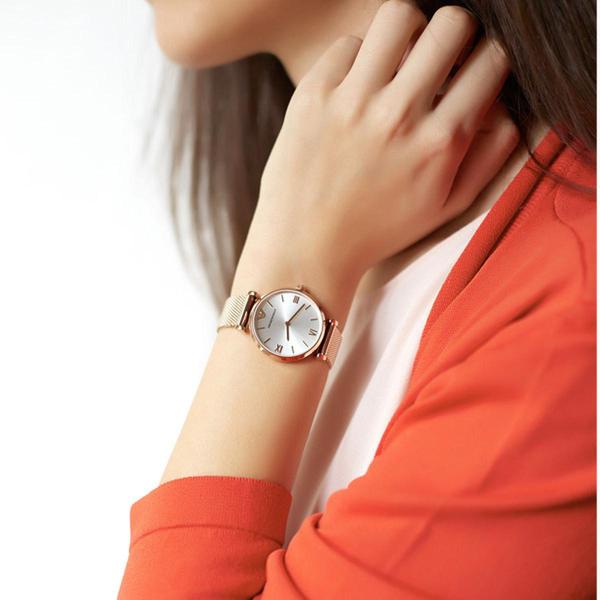 Emporio Armani AR1956 watch worn on wrist with rose gold case and mesh bracelet