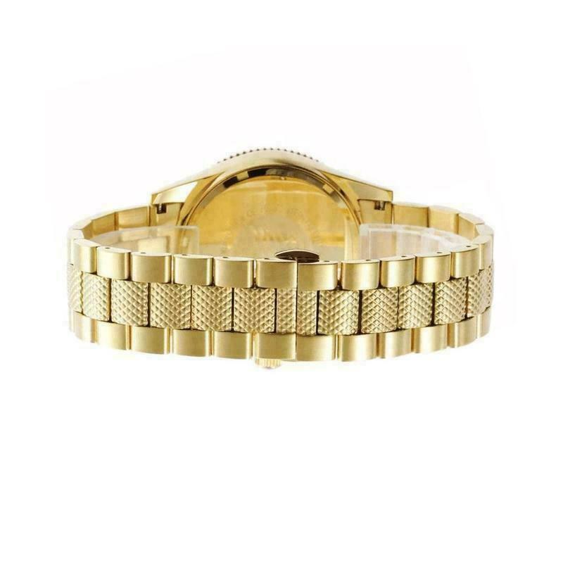 Back view of Emporio Armani AR5857 watch showing gold-tone stainless steel bracelet and caseback
