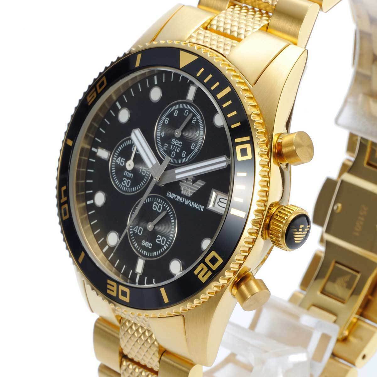 Side angle view of Emporio Armani AR5857 showing gold case profile and chronograph pushers