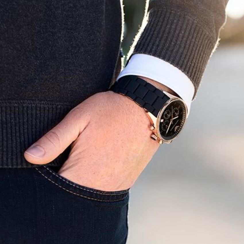 AR5905 chronograph watch worn on wrist with rose gold case and black strap