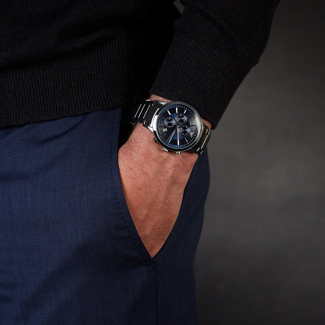 Emporio Armani Renato chronograph watch worn on wrist with blue dial visible