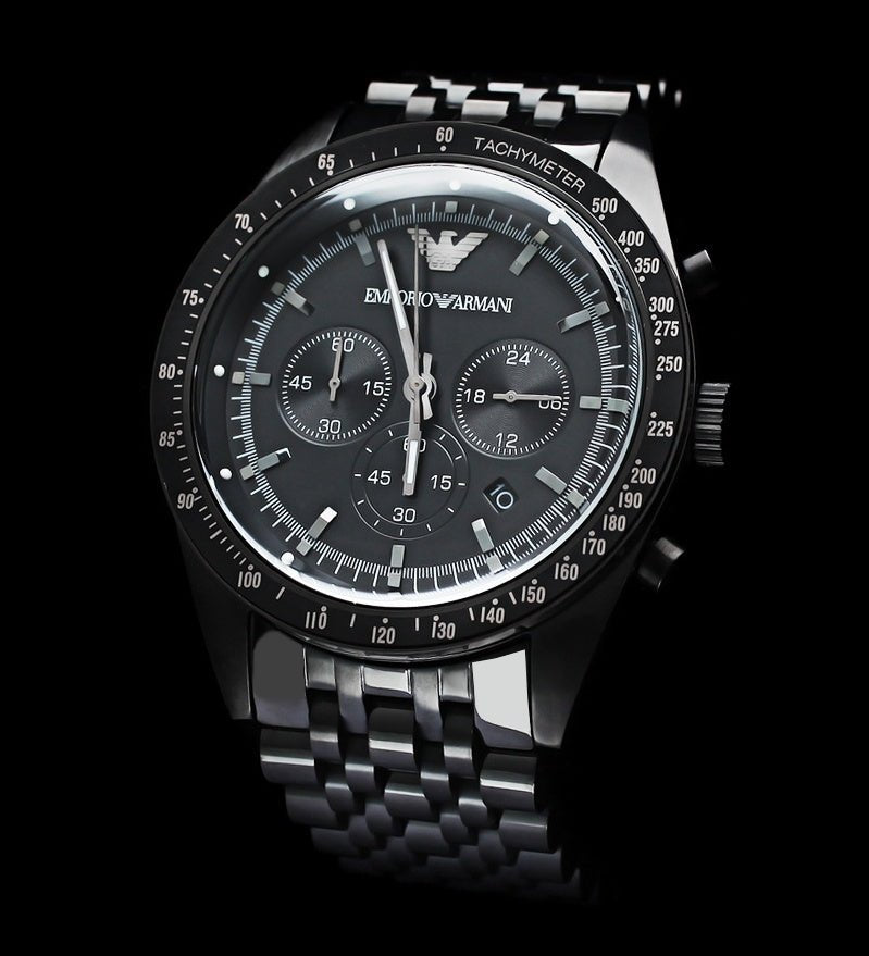 Emporio Armani Tazio AR5989 chronograph watch with matte black dial and steel bracelet on black background