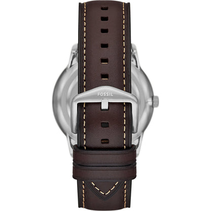 Caseback view of Fossil Neutra moonphase watch with silver case and brown leather strap with stitching