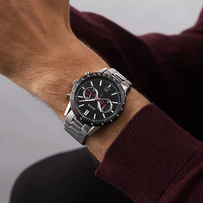 Hugo Boss Allure watch on wrist with maroon sweater showing chronograph dial and steel bracelet