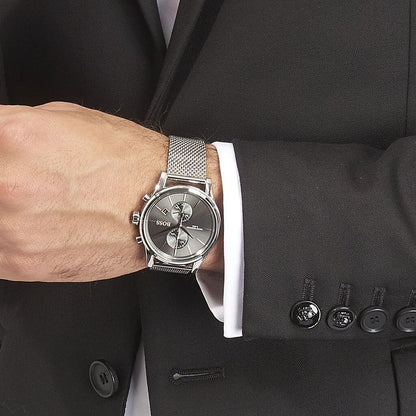 Hugo Boss Jet chronograph watch worn on wrist with silver mesh bracelet and grey dial visible