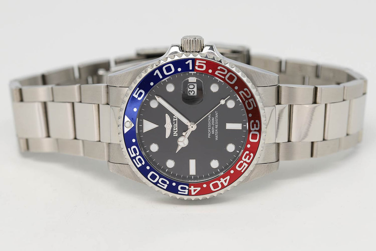 Invicta Pro Diver watch angled view showing steel bracelet and Pepsi bezel