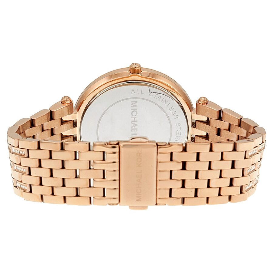 Michael Kors Darci caseback showing rose gold bracelet with crystal accents