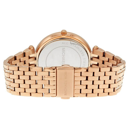 Michael Kors Darci caseback showing rose gold bracelet with crystal accents