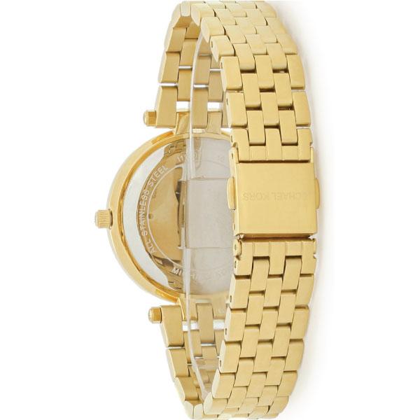Side angle view of Michael Kors Darci gold watch showing bezel and bracelet detail