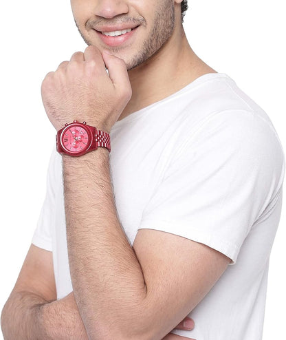 Red chronograph watch worn on male wrist with all red stainless steel case and bracelet