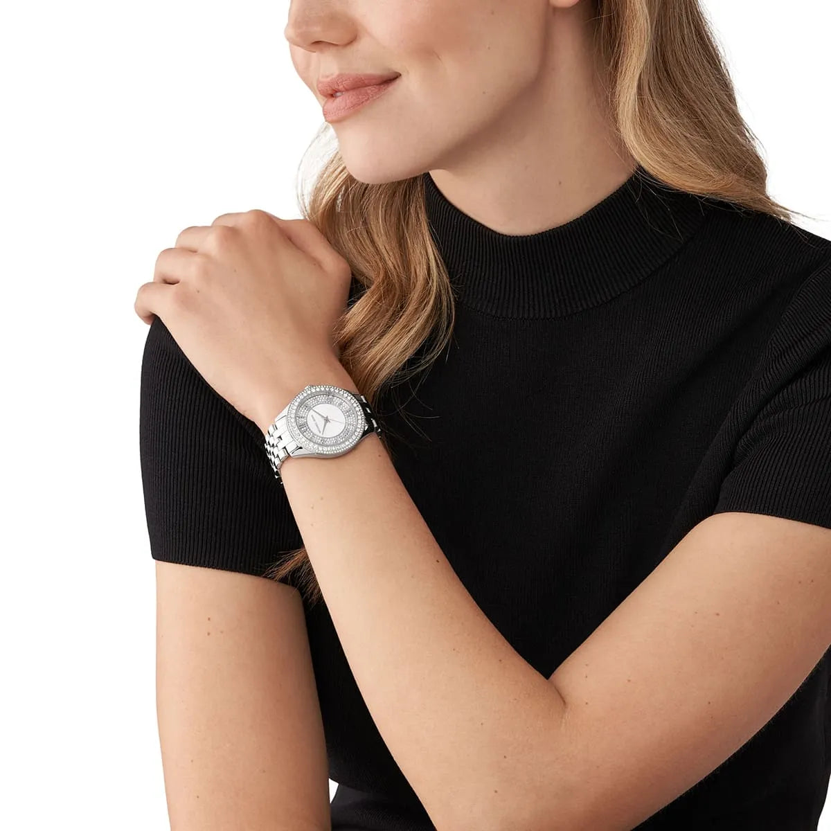 Michael Kors Harlowe watch worn on wrist with pavé crystal bezel catching light