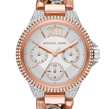 Close-up of Camille watch dial showing silver surface with rose gold markers and three chronograph subdials