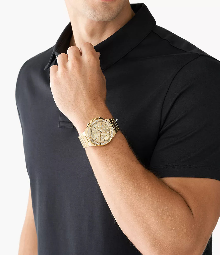 Michael Kors Lennox gold chronograph watch worn on wrist