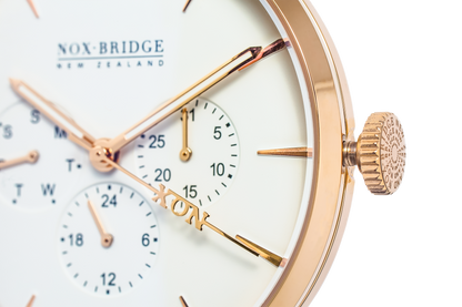 Close-up of Noxbridge Classic Izar dial showing chronograph subdials, rose gold case, and crown detail