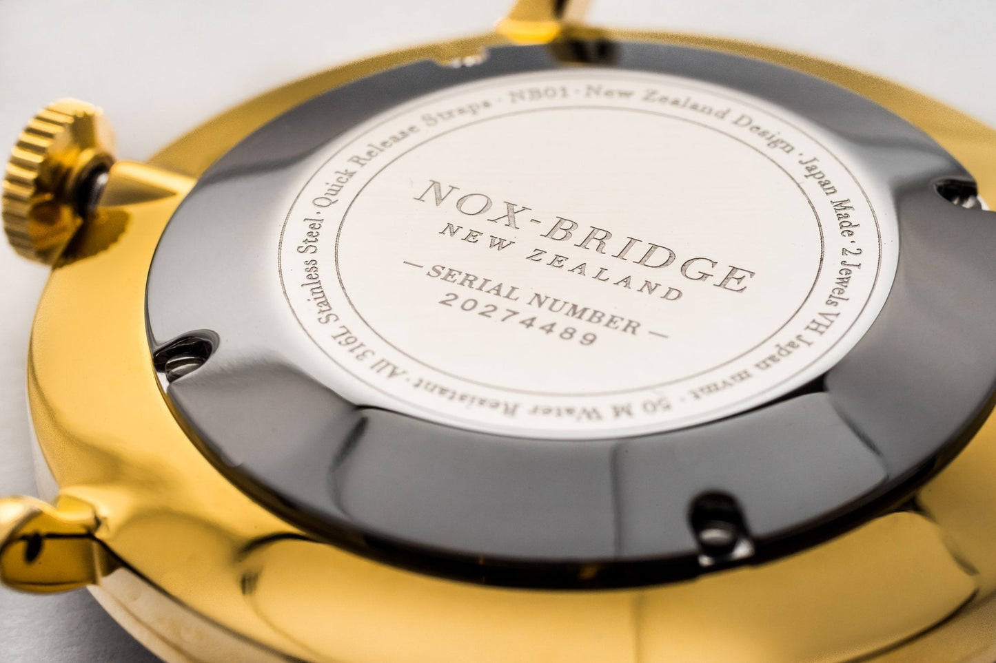 Noxbridge VG36 caseback with serial number and New Zealand branding