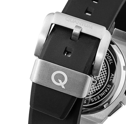 Quantum watch strap detail showing black silicone band with stainless steel buckle