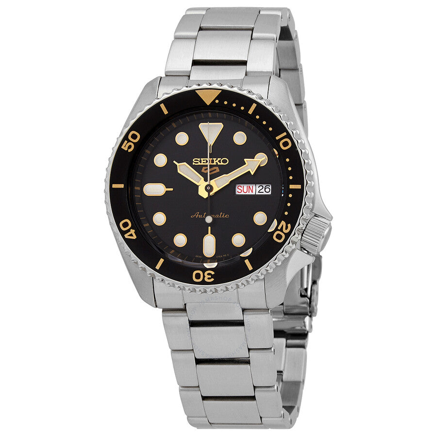 Seiko 5 Sports automatic watch with black dial, gold markers, and stainless steel bracelet