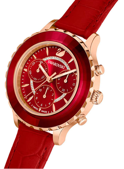 Swarovski Octea Lux Chrono watch at angle showing red faceted bezel, dial, and strap