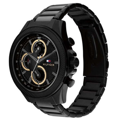 Tommy Hilfiger Damon watch angled view showing black case and metal bracelet with chronograph dial