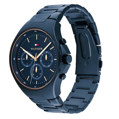 Tommy Hilfiger Justin blue chronograph watch shown at angle with steel bracelet visible