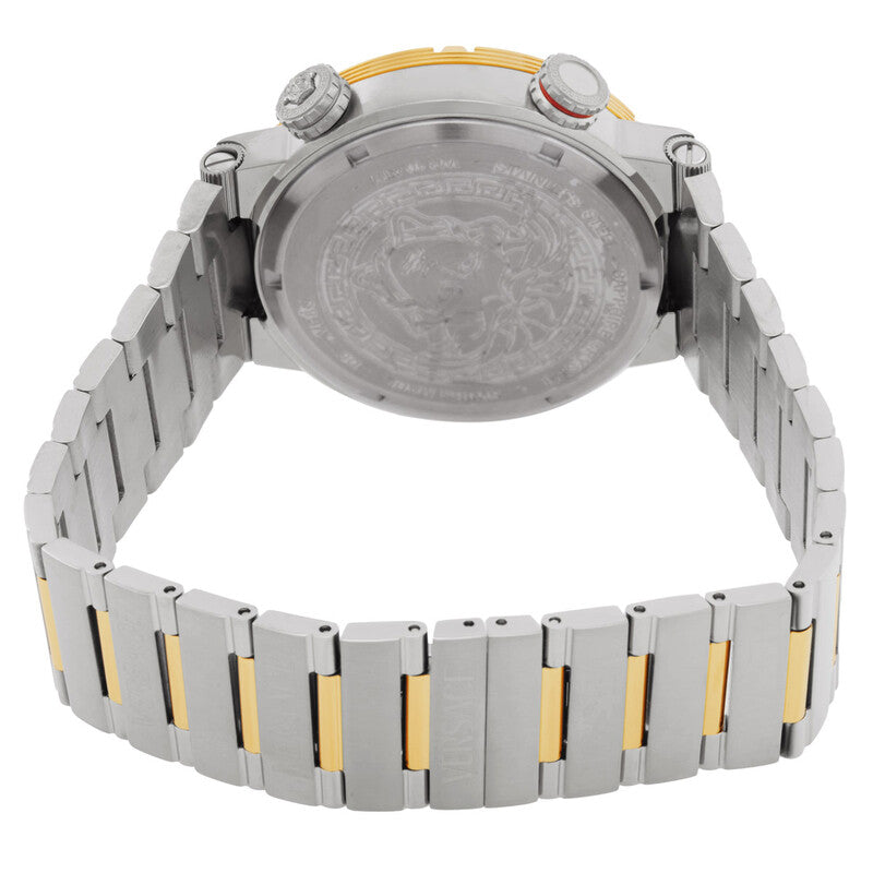 The back view of a stainless steel watch with a two-tone gold and silver link bracelet, featuring a clear crystal case back with an engraved tiger design.