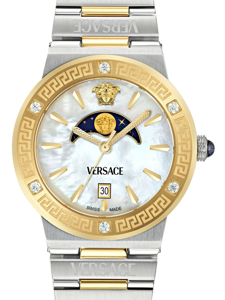 Mother of pearl dial detail with moonphase complication, gold Greca bezel and diamond indices