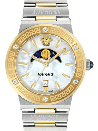 Mother of pearl dial detail with moonphase complication, gold Greca bezel and diamond indices