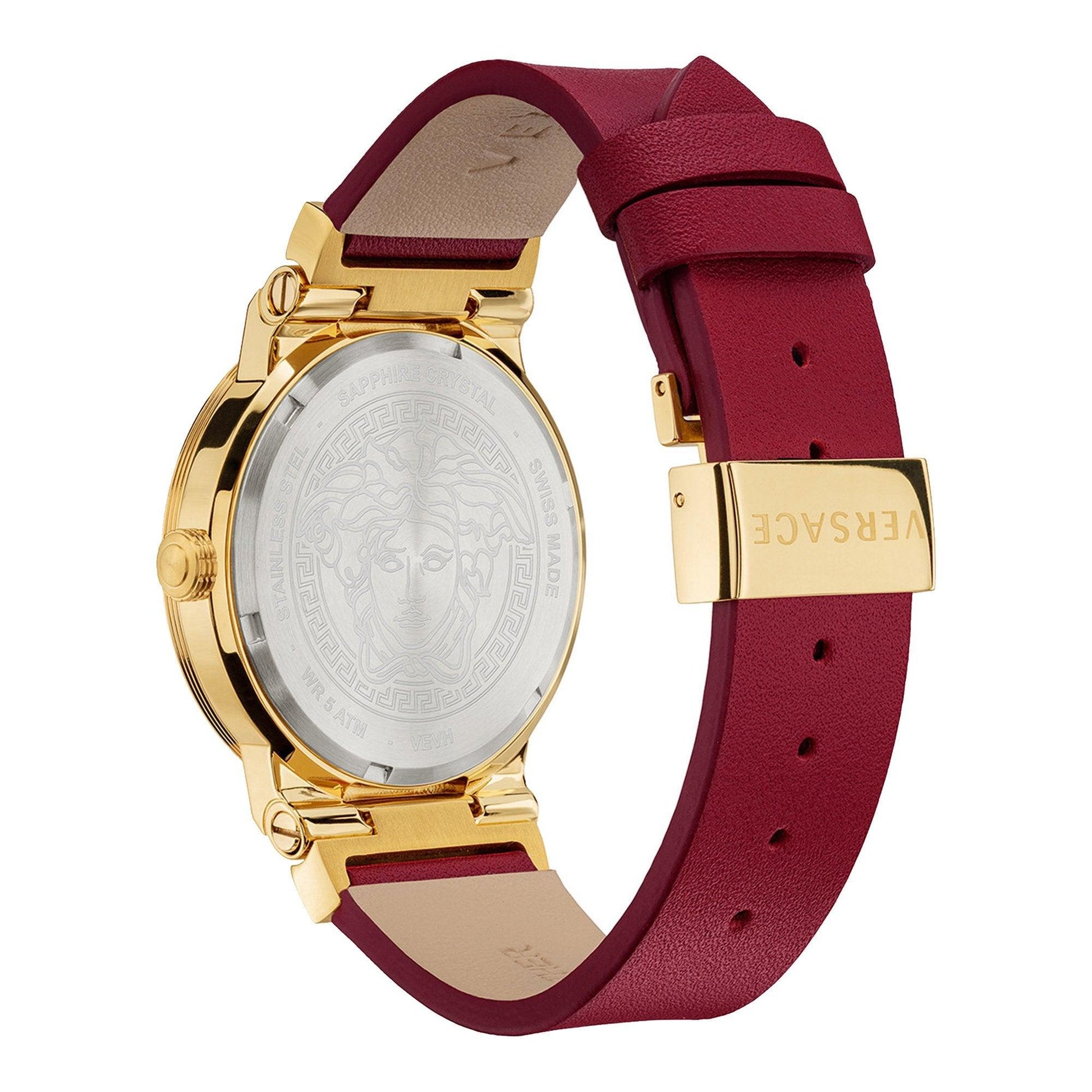 Caseback view of Versace Greca watch showing Medusa medallion engraving on white dial