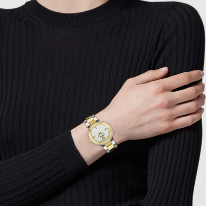 Versace Reve women's watch worn on wrist, white dial with gold hour markers